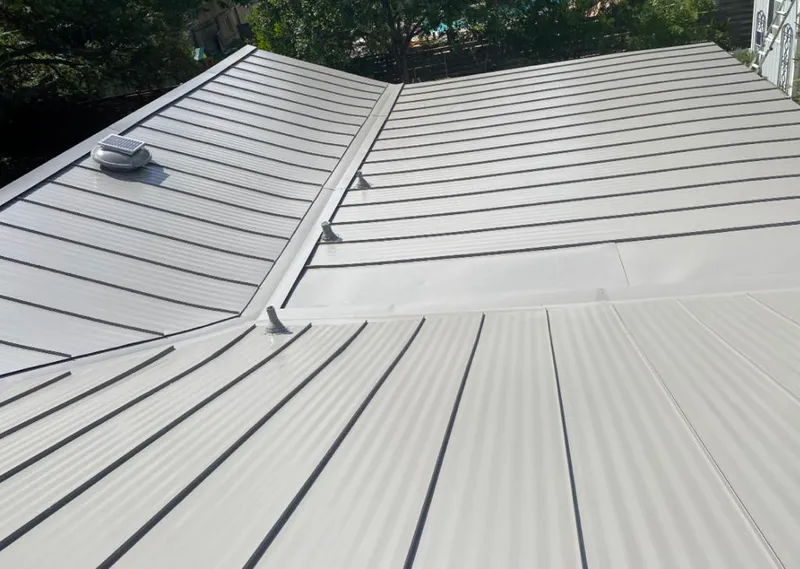 Solar attic fan installed on a metal roof for Roof Ventilation in Rancho Mission Viejo